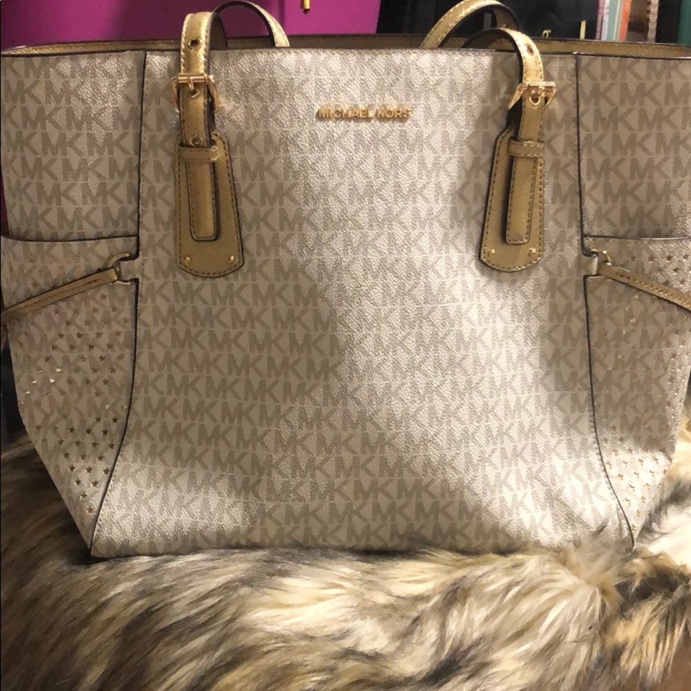 Gold and white Michael Kors tote